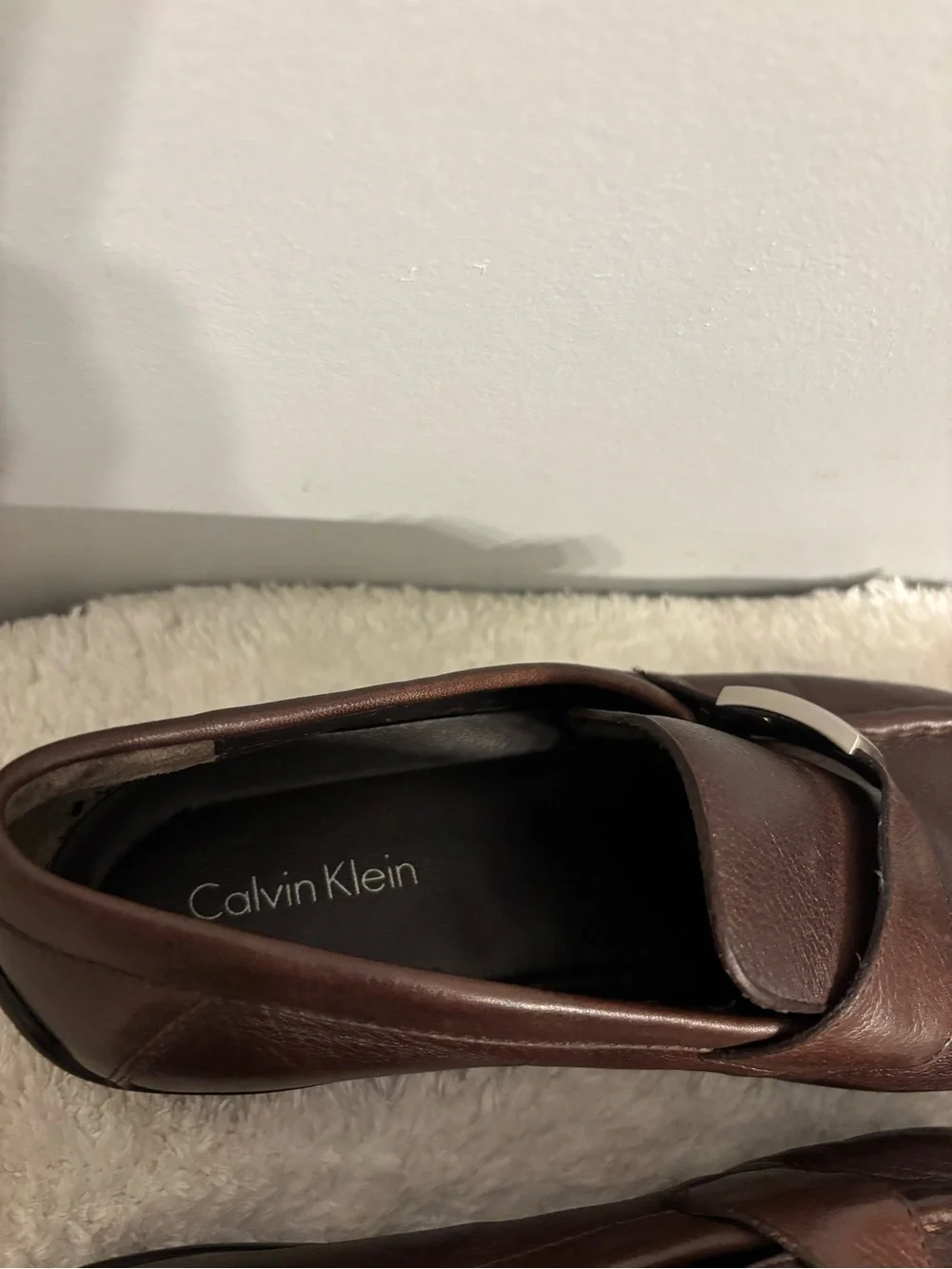 Calvin Klein Men's Dark Brown Leather Slip-Ons with Silver Logo Accent
